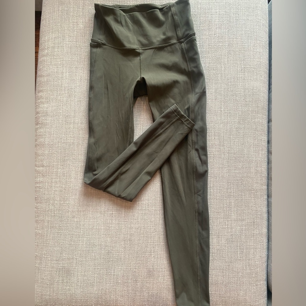 Lululemon hunter green leggings. Size 6 - with side pockets